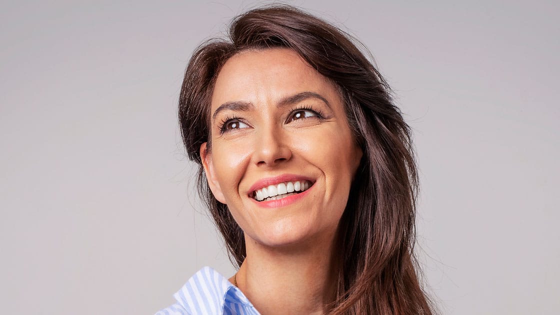 smiling woman in business shirt