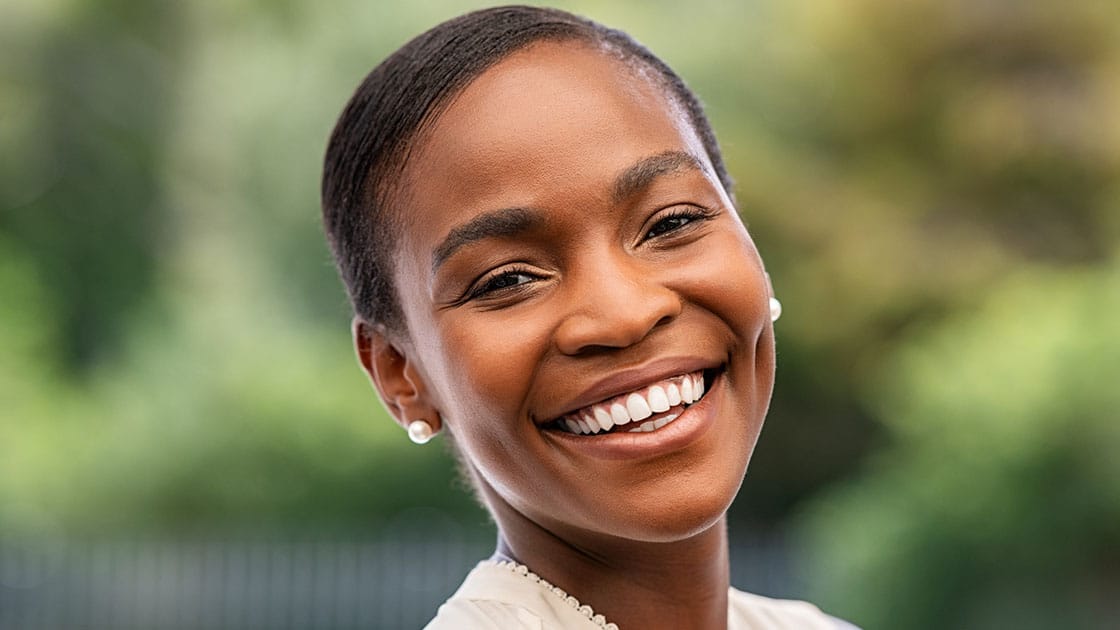 smiling woman in park